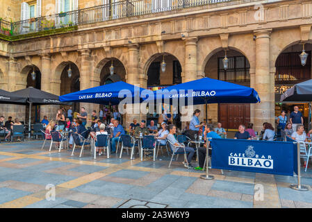 16/09-19, Bilbao, Spain. The terrass of Café Bar Bilbao full of people, on Plaza Nueva. Stock Photo