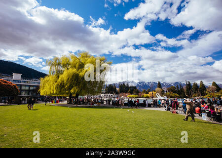 Queenstown, New Zealand - September 28 2019: The famous Queenstown Farmers Market in Earnslaw Park on a sunny spring day in New Zealand Stock Photo
