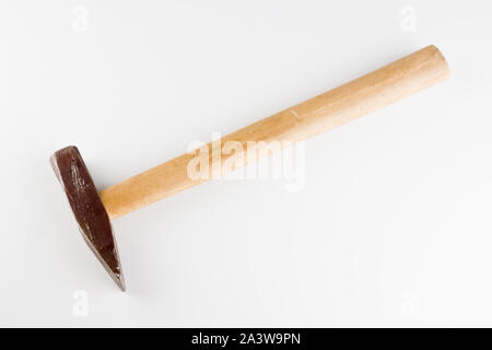 Small hammer with wooden handle isolated on a white background Stock Photo