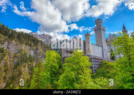 Neuschwanstein Castle situated in the mountains Stock Photo