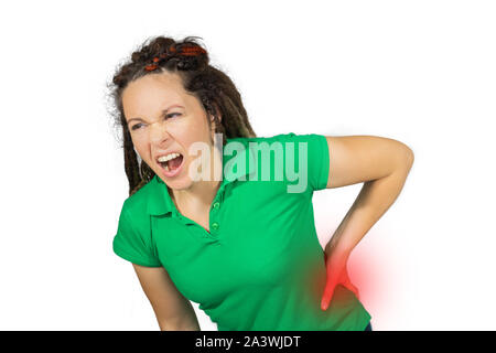 Health Issues. Closeup Of Beautiful Young Woman Having Backache, Strong Back Pain. Female Painful Feeling In back Muscles, Holding Hands On Her Body. Stock Photo