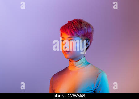 Creative shot of futuristic asian young adult Stock Photo