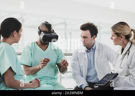 Medical professionals testing VR technology Stock Photo