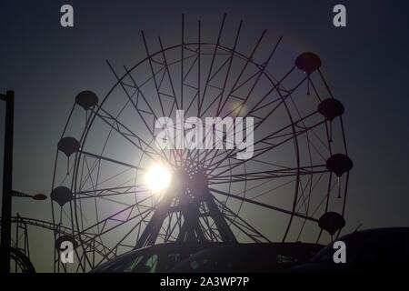 Codona's Grampian Eye Ferris Wheel, Silhouetted Abstract, During the Winter Off Season. Aberdeen, Scotland, UK. Stock Photo