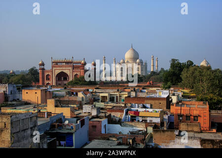 Rooftops of Taj Ganj neighborhood and Taj Mahal in Agra, India. Taj Mahal was build in 1632 by Emperor Shah Jahan as a memorial for his second wife Mu Stock Photo