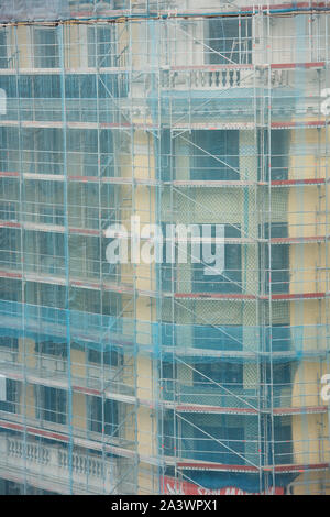 Building covered in scaffolding on the Gran Via in Madrid, Spain Stock Photo