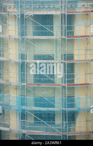 Building covered in scaffolding on the Gran Via in Madrid, Spain Stock Photo