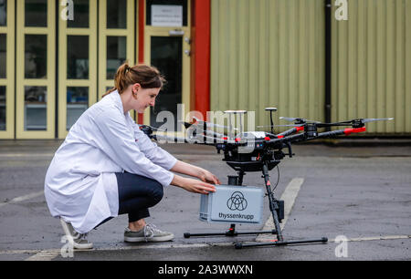 Duisburg, Ruhr area, North Rhine-Westphalia, Germany - ThyssenKrupp Steel transports samples by drone. The autonomously flying transport drone oscilla Stock Photo