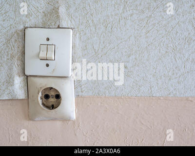 Old light switch and outlet in the apartment Stock Photo - Alamy