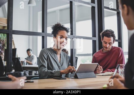 African American businesswoman giving a presentation in a meeting Stock Photo