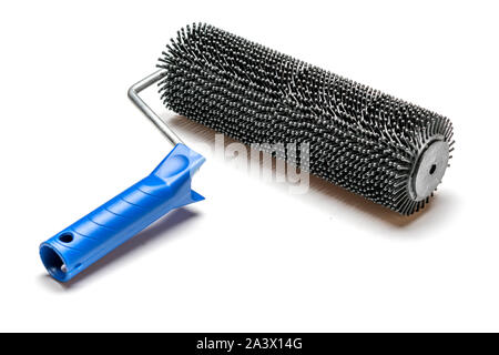 Needle roller for bulk floor on white background. Stock Photo
