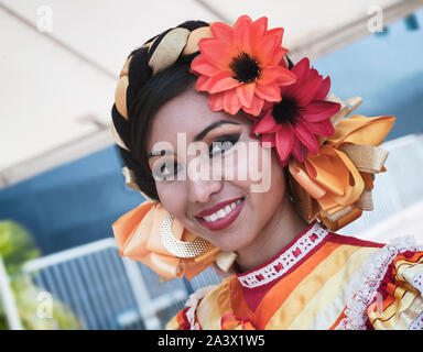 Puerto Vallarta, Mexico - April 30, 2011: Young Girl Dressed In Bright Colorful Traditional Clothing Stock Photo