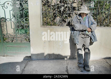 A normal Peruvian life with a pocket of dried Coca leaves. Peru. Stock Photo