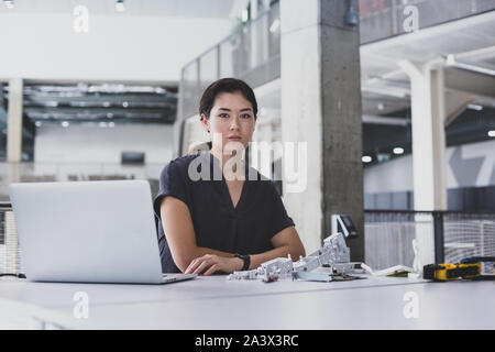 Portrait of female robotic engineer Stock Photo