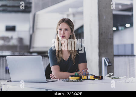 Portrait of female robotic engineer Stock Photo