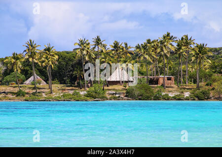 View of Faiava Island from  Ouvea, Loyalty Islands, New Caledonia. Faiava Island has a land area of only around 50 acres. Stock Photo