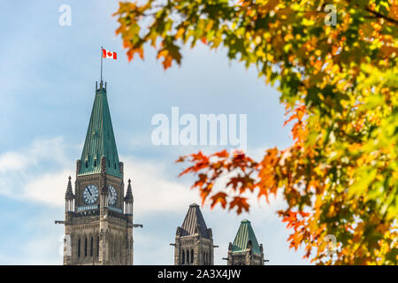 Peace Tower of the  Canadian Parliament with Autumn Foliage in Ottawa. Stock Photo