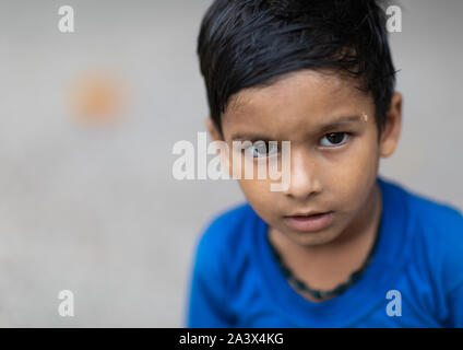 Portrait of a rajasthani boy in blue clothes, Rajasthan, Bundi, India Stock Photo