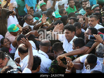 October 10, 2019, Colombo, Sri Lanka: Presidential candidate of Sri Lanka's governing party Sajith Premadasa wave to supporters during their first election campaign rally in Colombo, Sri Lanka, Thursday, October. 10, 2019. (Credit Image: © Pradeep Dambarage/ZUMA Wire) Stock Photo