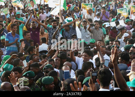 October 10, 2019, Colombo, Sri Lanka: Presidential candidate of Sri Lanka's governing party Sajith Premadasa wave to supporters during their first election campaign rally in Colombo, Sri Lanka, Thursday, October. 10, 2019. (Credit Image: © Pradeep Dambarage/ZUMA Wire) Stock Photo