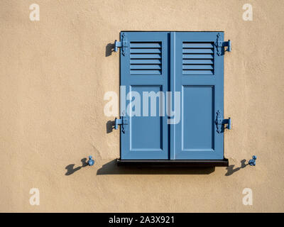Pretty window with shutters on an old building in Alscae France Stock Photo