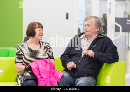 Group of people waiting their turn in a hospital lobby Stock Photo