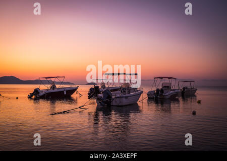 Beautiful sunrise in the little harbor on the island of Zakynthos, Greece. Stock Photo