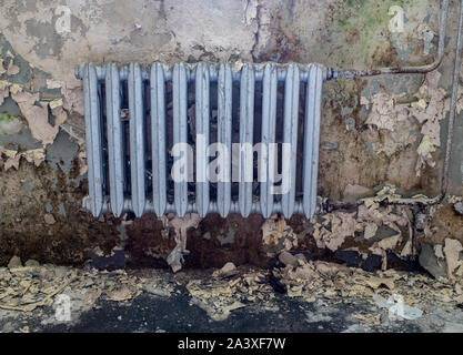 Old heating after water damage Stock Photo