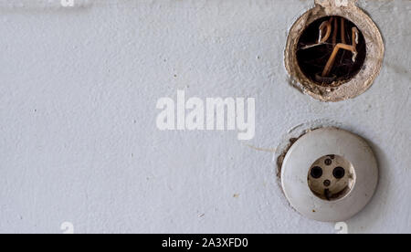 Old socket on the wall Stock Photo