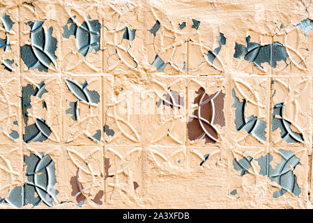 Scuffed yellow tiles on the floor. Seamless wallpaper pattern. Stock Photo
