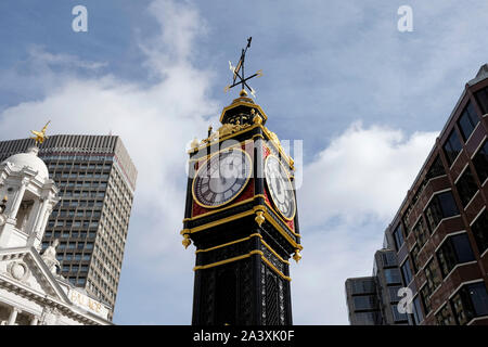 Little Ben, a cast iron miniature clock tower outside Victoria station in central London, UK Stock Photo