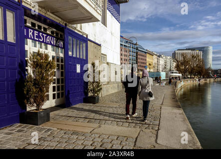 Donaukanal Viena Danube Canal, people are walking by the river Austria Stock Photo