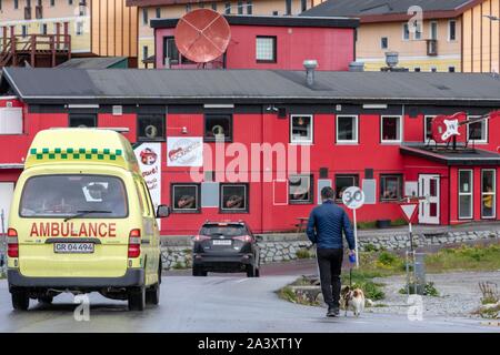 AMBULANCE IN FRONT OF THE CAFE AND CONCERT BAR THE ROCKHOUSE, TOWN OF QAQORTOQ, GREENLAND, DENMARK Stock Photo