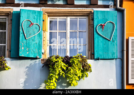 Open old wooden shutter on a window in Colmar France Stock Photo
