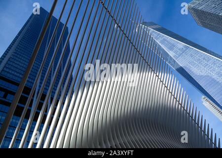 DETAIL OF THE OCULUS, FUTURIST STATION IN THE FORM OF BIRD'S WINGS IN FRONT OF THE ONE WORLD TRADE CENTER TOWER, MANHATTAN, NEW YORK, UNITED STATES, USA Stock Photo