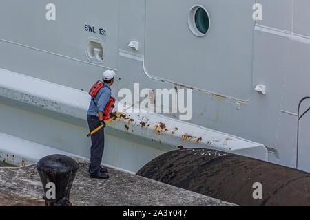 ANTIGUA, WEST INDIES - November 30, 2017: Cruise ship employees do a very hard job under difficult circumstances. They find privacy and fun when and w Stock Photo