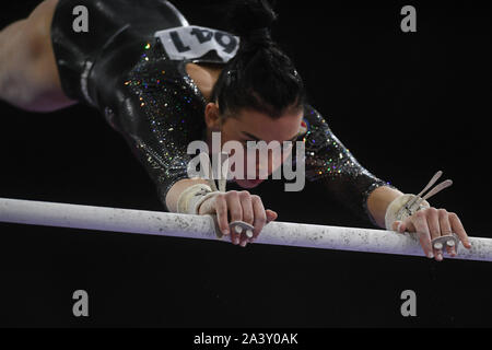 Stuttgart, Germany. 10th Oct, 2019. GIORGIA VILLA from Italy swings on the uneven bars during the competition held in the Hanns-Martin-Schleyer-Halle in Stuttgart, Germany. Credit: Amy Sanderson/ZUMA Wire/Alamy Live News Stock Photo