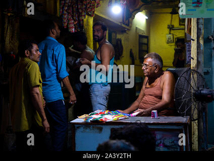 Indian people in a shops in the street, Rajasthan, Jodhpur, India Stock Photo