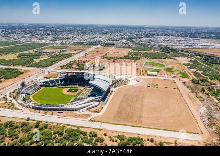 Aerial view, aerial photography of the Yaquis baseball stadium of Ciudad Obregon, of the Mexican Pacific League. LMP . Panoramic of baseball stadium. Drop me, Yaqui Valley. © (© Photo: LuisGutierrez / NortePhoto.com)  pclaves: Baseball picture, Baseball diamond, pitch, Architecture, sports complex, sports architecture, baseball, sports, outdoor, no people, Stadium architecture, stadium facade, Sport architecture, Architectural design, green, green grass, lawn, stands, stadium, Drone, aerial, sky Aerial view of the Sonora stadium and diamond of the playing field, baseball team, Sonora, Mexico, Stock Photo