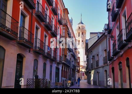 calle castelar de valladolid con la torre de la iglesia del salvador al fondo. Castilla y Leon, España- Stock Photo