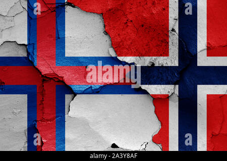 flags of Faroe Islands and Norway painted on cracked wall Stock Photo ...