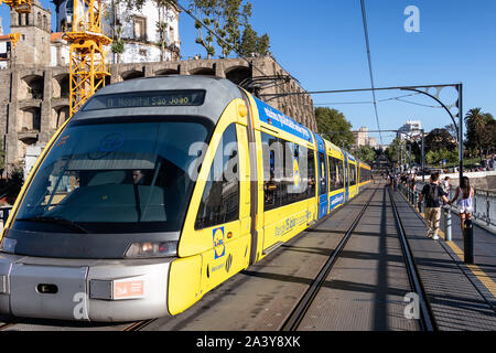 Porto, Portugal, July 19, 2019: View of the metro tram train crossing the Dom Luis I bridge in Porto, Portugal Stock Photo