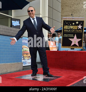 Los Angeles, United States. 10th Oct, 2019. Music industry mogul and executive Tommy Mottola gestures as he stands atop his star during an unveiling ceremony honoring him with the 2,676th star on the Hollywood Walk of Fame in Los Angeles on Thursday, October 10th, 2019. Photo by Jim Ruymen/UPI Credit: UPI/Alamy Live News Stock Photo