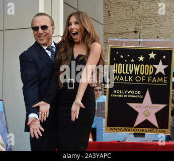 Los Angeles, United States. 10th Oct, 2019. Music industry mogul and executive Tommy Mottola is joined by his wife, actress Thalia Mottola (R) during an unveiling ceremony honoring him with the 2,676th star on the Hollywood Walk of Fame in Los Angeles on Thursday, October 10th, 2019. Photo by Jim Ruymen/UPI Credit: UPI/Alamy Live News Stock Photo