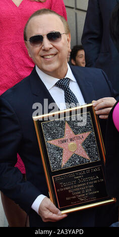 Los Angeles, United States. 10th Oct, 2019. Music industry mogul and executive Tommy Mottola holds a replica plaque during an unveiling ceremony honoring him with the 2,676th star on the Hollywood Walk of Fame in Los Angeles on Thursday, October 10th, 2019. Photo by Jim Ruymen/UPI Credit: UPI/Alamy Live News Stock Photo