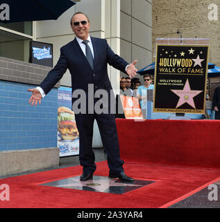 Los Angeles, United States. 10th Oct, 2019. Music industry mogul and executive Tommy Mottola gestures as he stands atop his star during an unveiling ceremony honoring him with the 2,676th star on the Hollywood Walk of Fame in Los Angeles on Thursday, October 10th, 2019. Photo by Jim Ruymen/UPI Credit: UPI/Alamy Live News Stock Photo