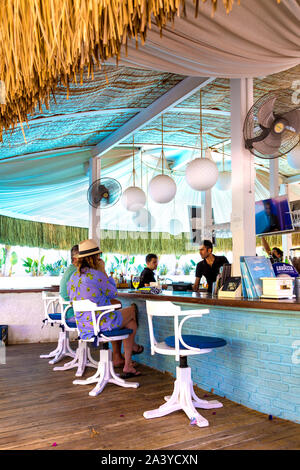 People sitting at a bar in luxury Yacht Classic Hotel, Ece Marina, Fethiye, Turkish Riviera, Turkey Stock Photo