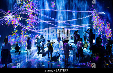 People exploring and enjoying borderless world digital art exhibition of teamLab at Mori Building, Odaiba, Tokyo, Japan. Stock Photo