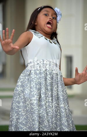 Diverse Girl And Fear Wearing Dress Stock Photo