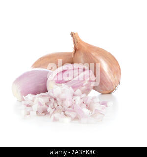 Whole and chopped shallots isolated on a white background with shadow Stock Photo